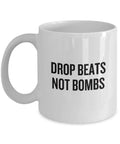 DJ Gift Drop Beats Not Bombs Coffee Mug EDM Hip Hop Graphic Tee – Aesthetic Look · Trending Graphic Apparel