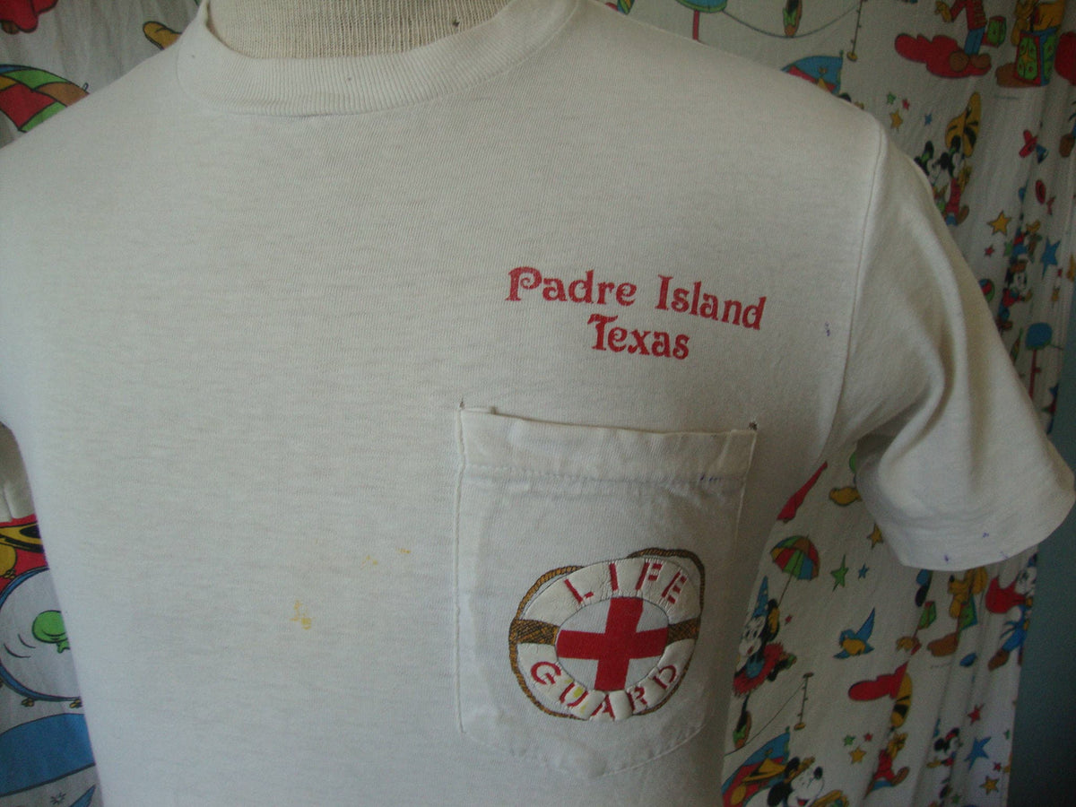 Vintage 8039s South Padre Island Texas Life Guard Tourist Pocket T Shirt Sz XS Graphic Tee – Fan Favorite · Great Gift For Fans