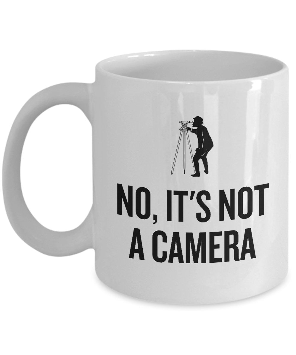 Funny Surveying Mug Surveyor Gift Idea Land Surveyor Mug No It39s Not A Camera Graphic Tee – Warm & Stylish · Trending Graphic Apparel