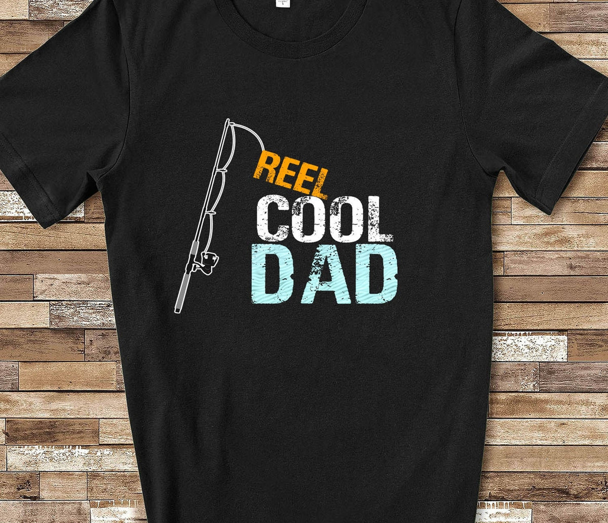 Reel Cool Dad Funny Father Shirt for Men Great for Fathers Day Birthday or Christmas Gifts for Dad Graphic Tee – Fan Favorite · Trending Graphic Apparel