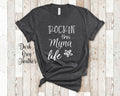 Rockin This Myna Life Grandma Tshirt Italian Grandmother Gift Idea for Mother39s Day Birthday Christmas or Pregnancy Reveal Announcement Graphic Tee – Fan Favorite · Must-Have Style