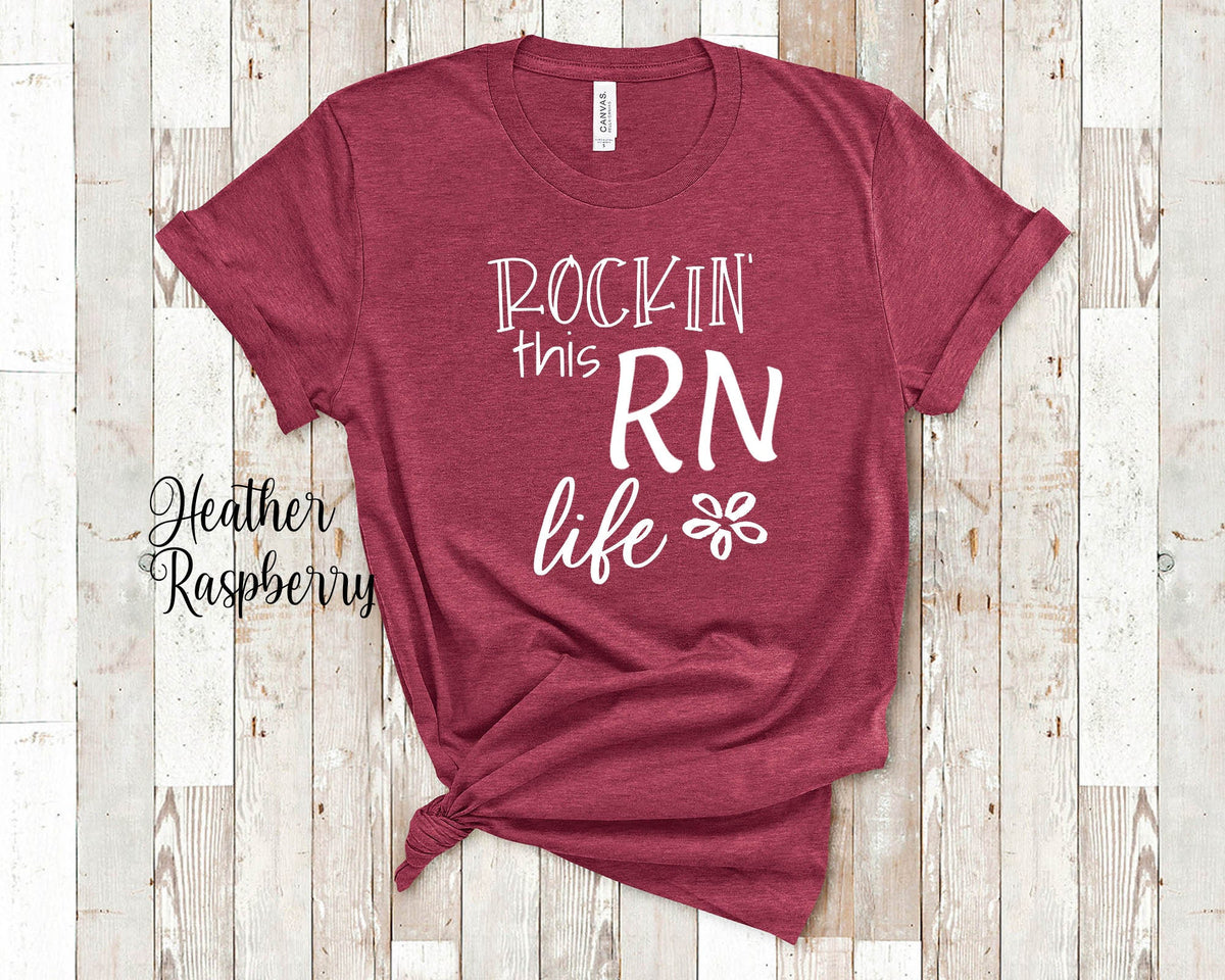 Rockin This Life Cute RN Tshirt Gift for Nurse Appreciation RN Granduation Rockin Life Funny Nurse Tshirt Gifts Nurse Gifts Graphic Tee – Soft Feel · Top Pick For Any Outfit