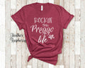 Rockin This Life Cute Preggo Tshirt Gift for Pregnant Friend Rockin Life Funny Pregnant Shirt Pregnancy Gifts Graphic Tee – Soft Feel · Perfect For Daily Wear