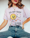 Silly Book Lover Tee Shirt with Retro Flowers and Sunshine On My Way to Read All Day Funny Bookish TShirt for Friend Who Loves To Read Graphic Tee – Cozy Vibes · High-Quality Print
