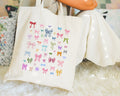 Cute Coquette Bow Tote Soft Girl Style Tote Bag for Friend Who Loves Bows Cute Pastel Goth Style Tote Bag Book Lover Cute Bookworm Gift Tote Bag – Warm & Stylish · High-Quality Print