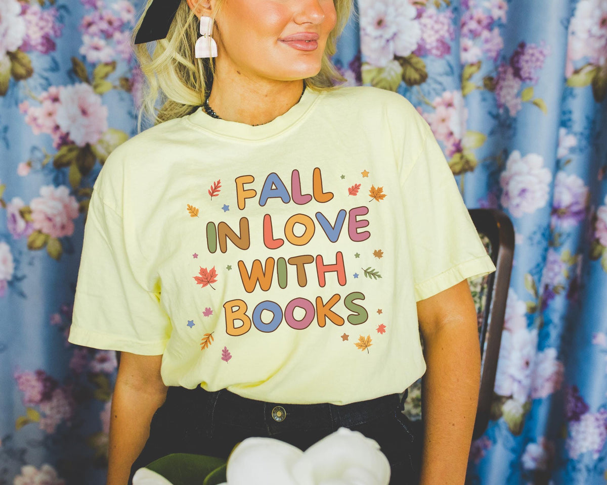Cute Fall Reading Teacher Tee Shirt Fall in Love With Books Adorable Y2K Aesthetic Bookish Shirt for School Librarian First Grade Teacher Graphic Tee – Premium Graphic · High-Quality Print