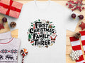 First Christmas as Family of Three Cute Holiday TShirt Fun Festive Christmas Tee for New Parents Xmas Family of Three Shirt Graphic Tee – Everyday Comfort · Trending Graphic Apparel