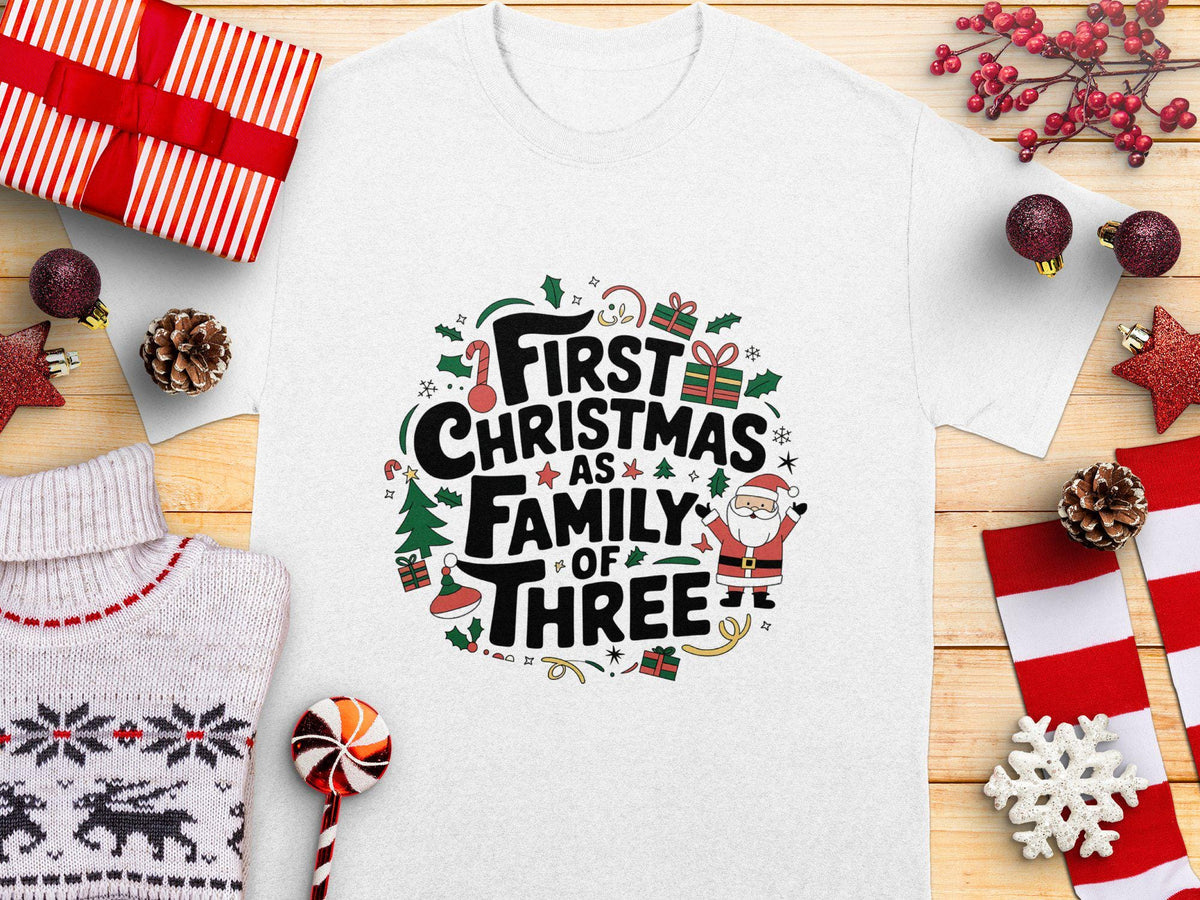 First Christmas as Family of Three Cute Holiday TShirt Fun Festive Christmas Tee for New Parents Xmas Family of Three Shirt Graphic Tee – Everyday Comfort · Trending Graphic Apparel