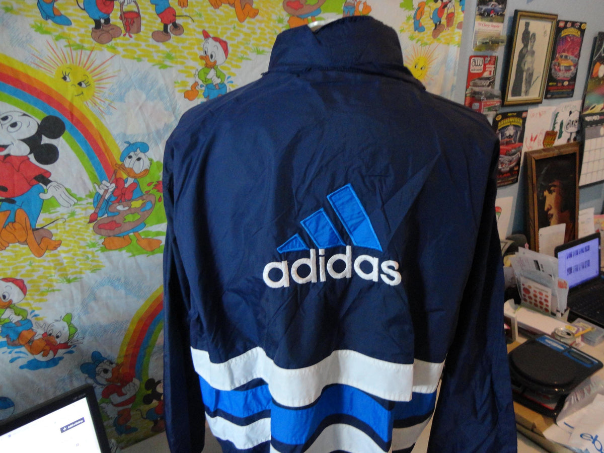 Vintage Adidas Navy Blue Windbreaker Jacket w Hideaway Hood Size XXL Graphic Tee – Feel-Good Design · Must-Have Style