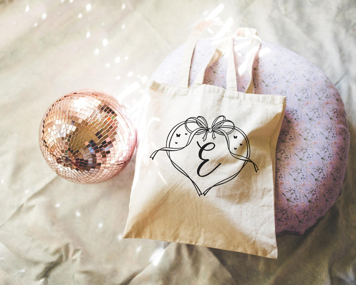 Cute Initial Tote Bag with Heart and Adorable Y2k Aesthetic Doodle Bow Butterfly Lover Minimal Tote with Ribbon Bridal Party Bachelorette Tote Bag – Easygoing Wear · Trending Graphic Apparel