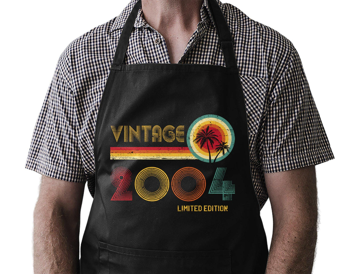 Made in 2004 BBQ Legend Apron Funny 21st Birthday Gift Kitchen Pro Grill Master Cooking Queen Unisex Present Chef 21 Years Old Graphic Tee – Bold Style · High-Quality Print