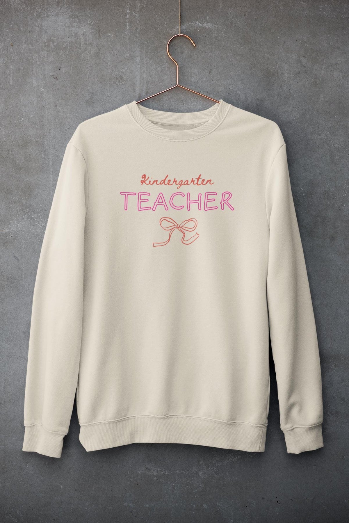 Kindergarten Teacher Sweatshirt with Bow Graduation Gift for Elementary Education Major or Cute Congratulations Present for New Teacher Sweatshirt – Aesthetic Look · Must-Have Style