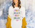 First Grade Teacher Tee Shirt with Cute 90s Aesthetic Doodles Colorful Matching Teacher TShirt for First Grade Crew New Teacher Present Graphic Tee – Feel-Good Design · Great Gift For Fans