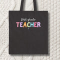 First Grade Teacher Tote Bag First Grade Teaching Cute First Day of School Colorful 90s Scrapbook Vibe New Teacher Congratulations Gift Tote Bag – Soft Feel · Top Pick For Any Outfit
