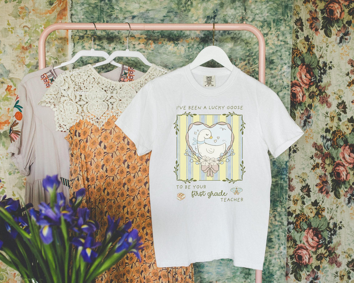 Last Day of School First Grade Teacher Tee Shirt with Silly Goose and Butterflies Class Dismissed End of School Year Animal Lover TShirt Graphic Tee – Soft Feel · Great Gift For Fans