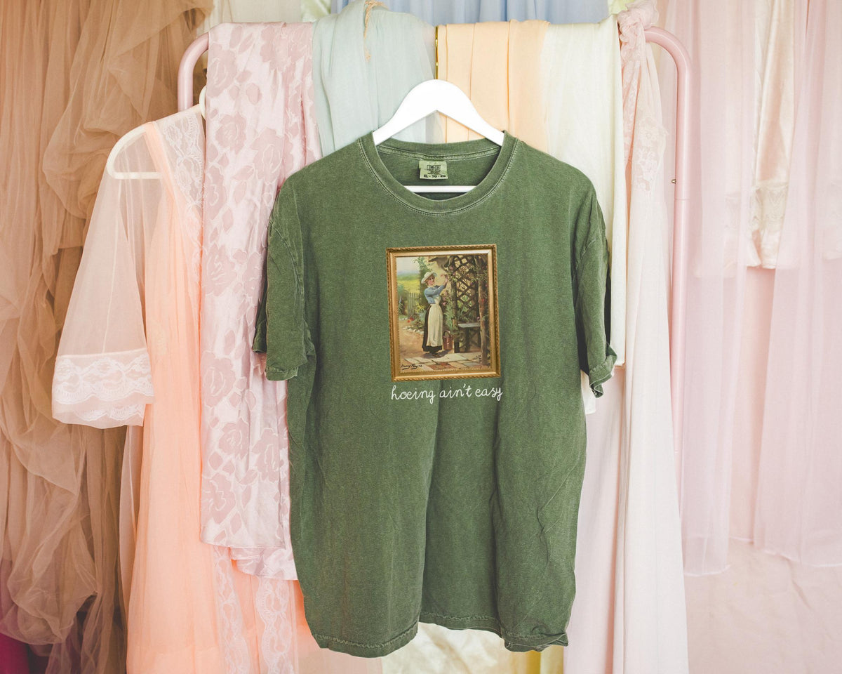 Hoeing Ain39t Easy Funny Gardening TShirt with 19th Century Painting of Woman Gardening Silly Garden Lover TShirt for Mom Who Gardens Graphic Tee – Cozy Vibes · Perfect For Daily Wear