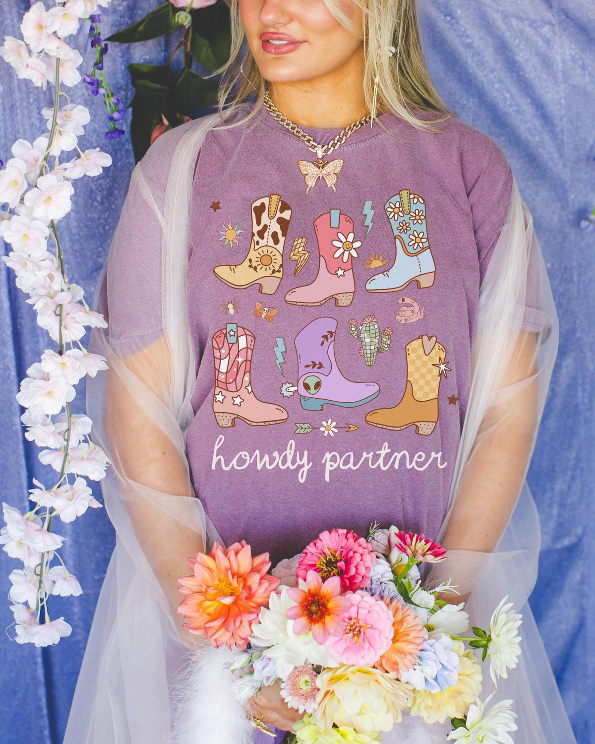 Howdy Partner UFO Cowboy Tee Shirt with Cowboy Boots and Stars Colorful and Cute Maximalist Alien Tee with Groovy Western Vibe for Summer Graphic Tee – Bold Style · Trending Graphic Apparel