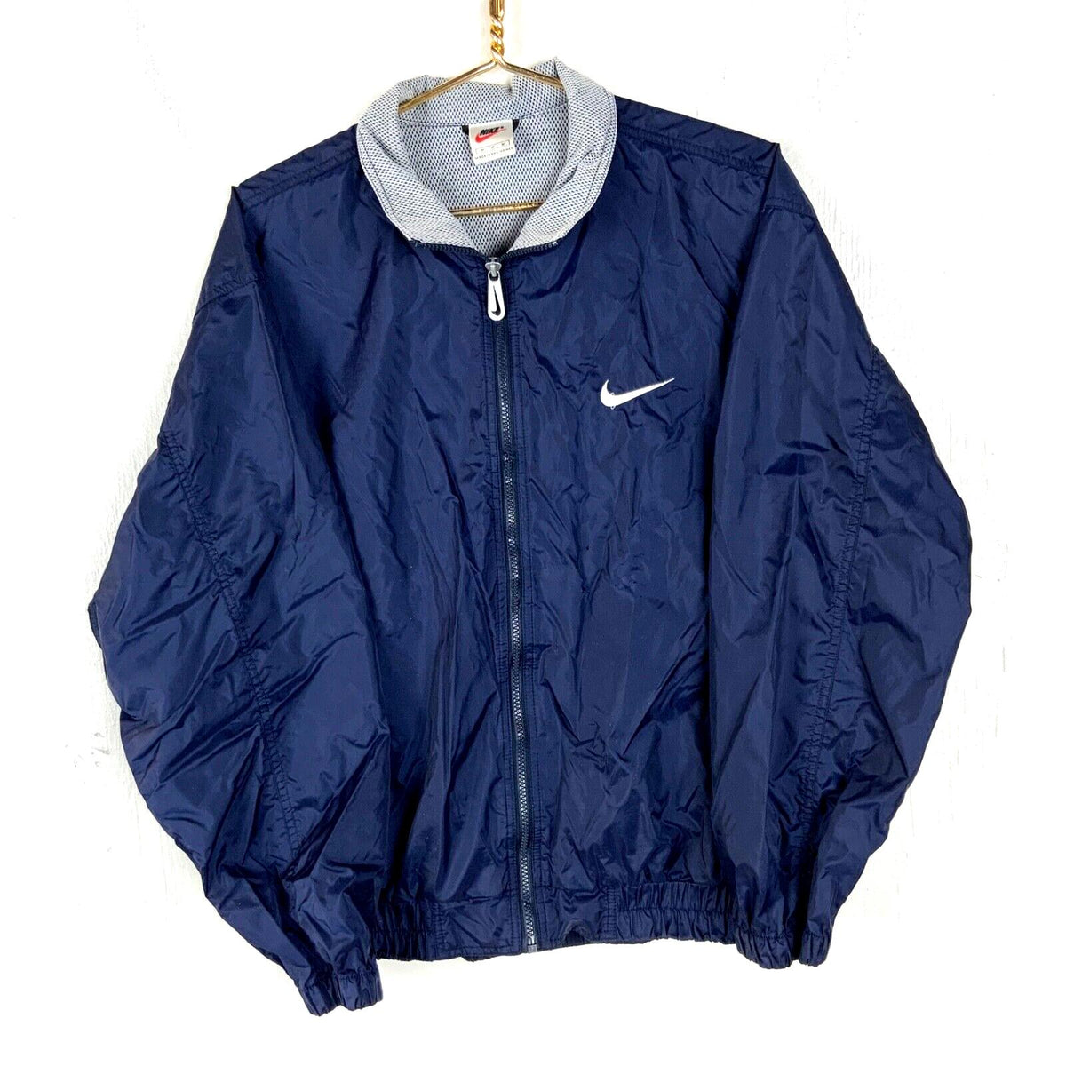 Vintage Nike Windbreaker Jacket Medium Blue Full Zip Lined 90s Graphic Tee – Cozy Vibes · Trending Graphic Apparel