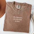 The Horrors Persist But So Do I Funny Saying TShirt for Friend Cute Birthday Gift Present for Sister Silly Minimalist Tee for Sister Graphic Tee – Cozy Vibes · High-Quality Print