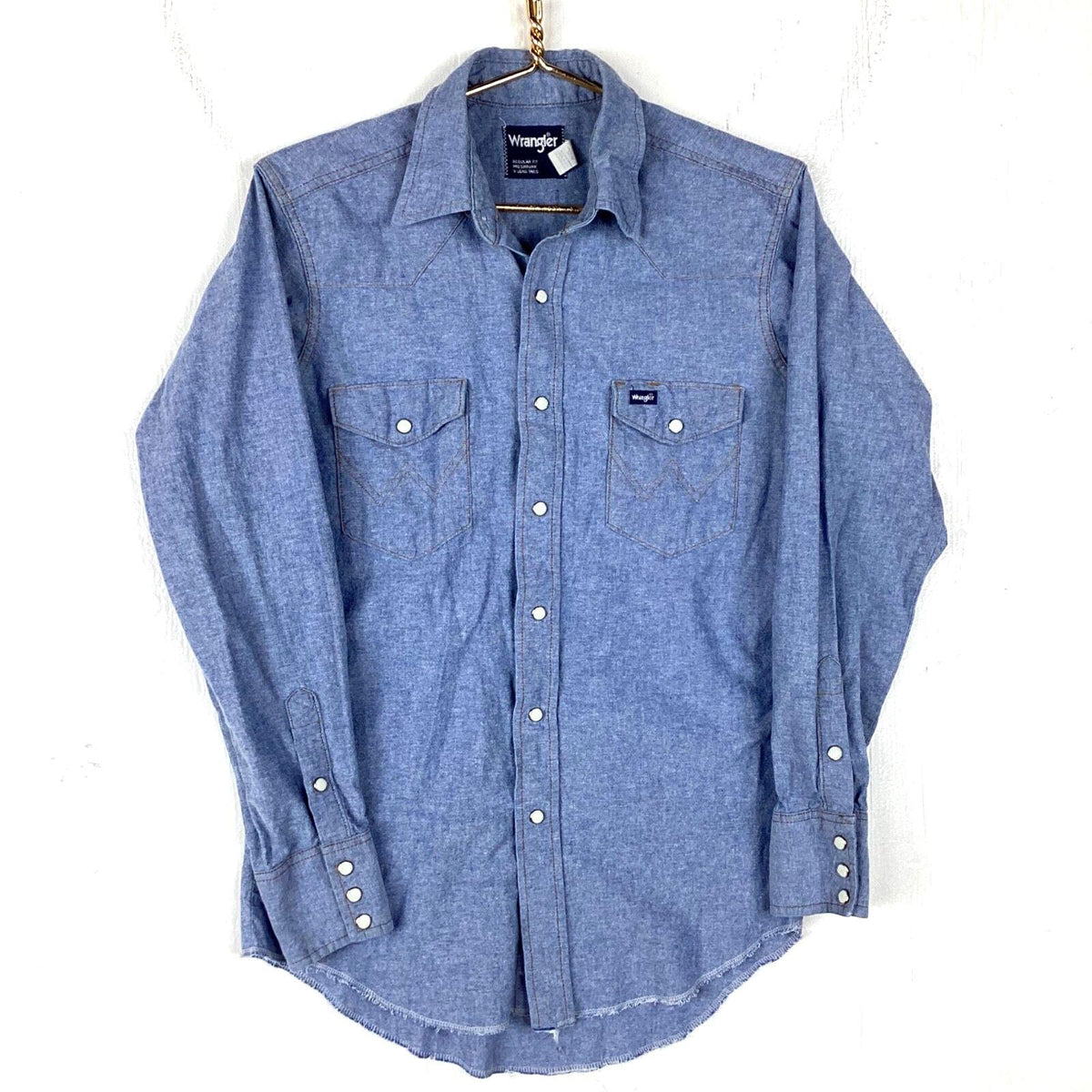 Vintage Wrangler 1980s Chambray Shirt Size Medium Blue Snap Button Long Sleeve Graphic Tee – Feel-Good Design · Trending Graphic Apparel