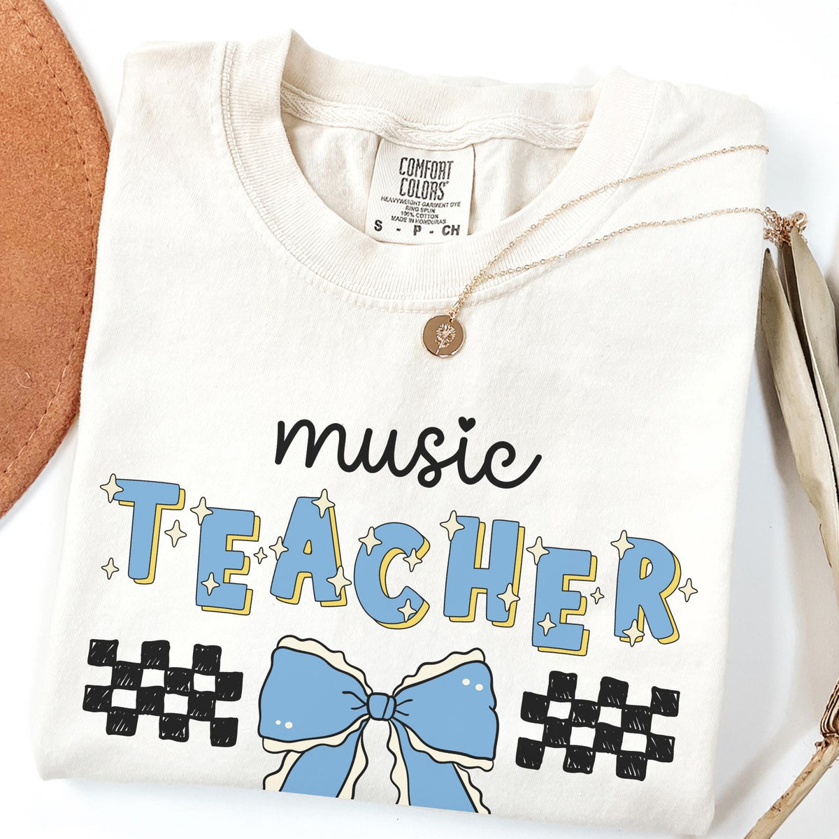 Music Teacher Tee Shirt with Cute Retro Aesthetic Bow Present for New Music Professor or Music Major Teaching Assistant Graduation Gift Graphic Tee – Soft Feel · Top Pick For Any Outfit
