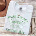 Funny Fayetteville Arkansas Sweatshirt Raise a Glass for Fayetteville Arkansas Silly Northwest Arkansas Crewneck for Friend Moving to NWA Sweatshirt – Cozy Vibes · Top Pick For Any Outfit
