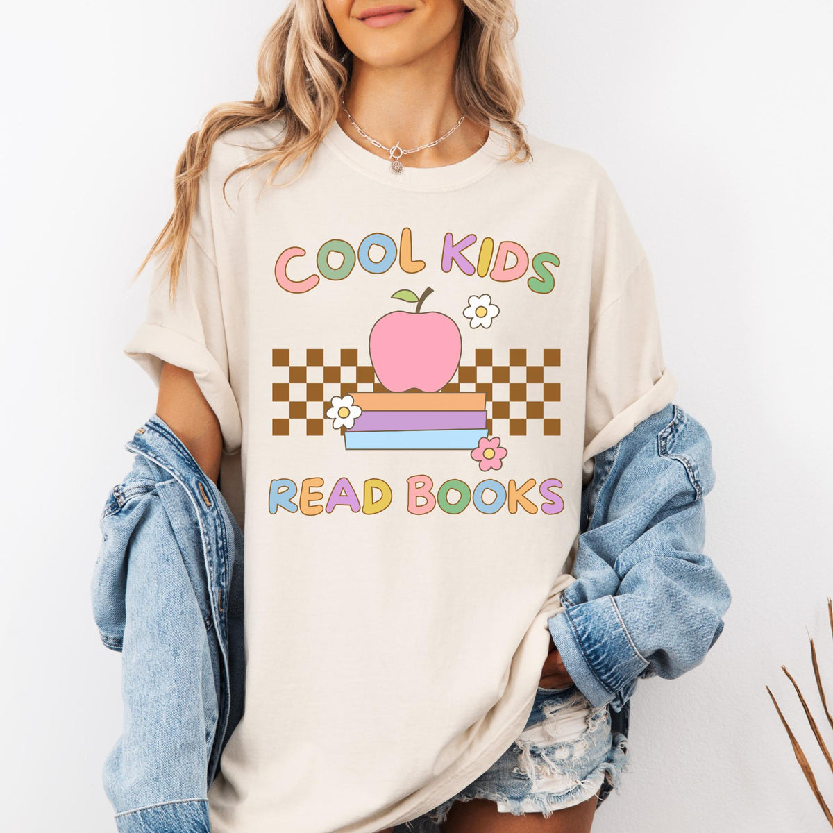 Reading Teacher Tee Shirt with Apple Sitting on Books Cool Kids Read Books Funny Saying Bookish Tee Shirt for School Librarian or Bookworm Graphic Tee – Easygoing Wear · High-Quality Print