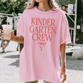 Kindergarten Crew Matching Teacher Tee Shirt with Messy Coquette Bow Colorful Kindergarten Teacher Tee for Back to School Meet the Teacher Graphic Tee – Soft Feel · Trending Graphic Apparel